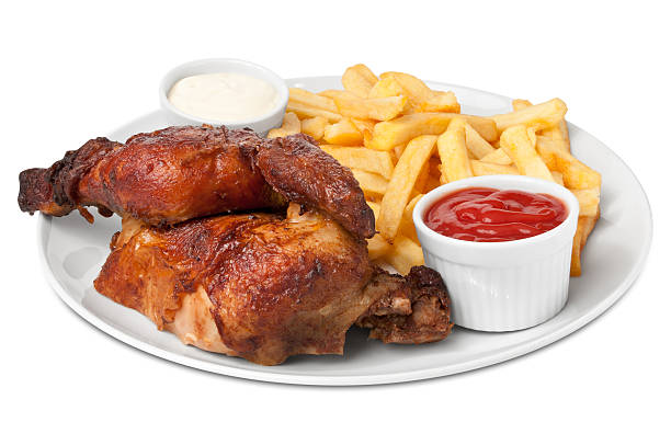 Chicken roasted with fries, clipping path included.