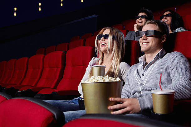 istock Laughing people at the cinema 152966702