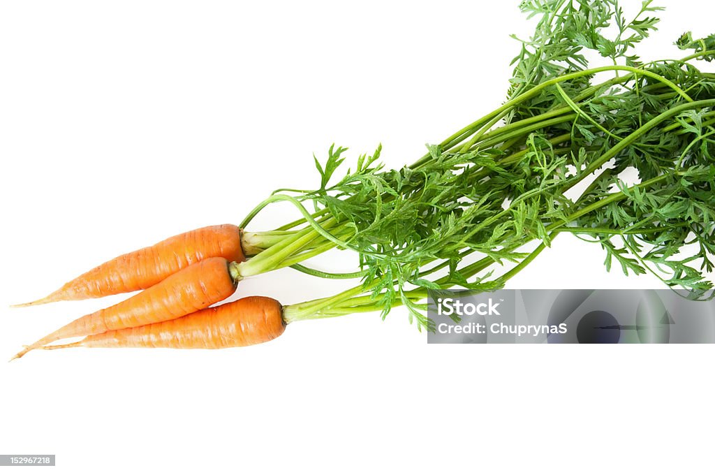 Mucchio di carote isolato su bianco - Foto stock royalty-free di Alimentazione sana