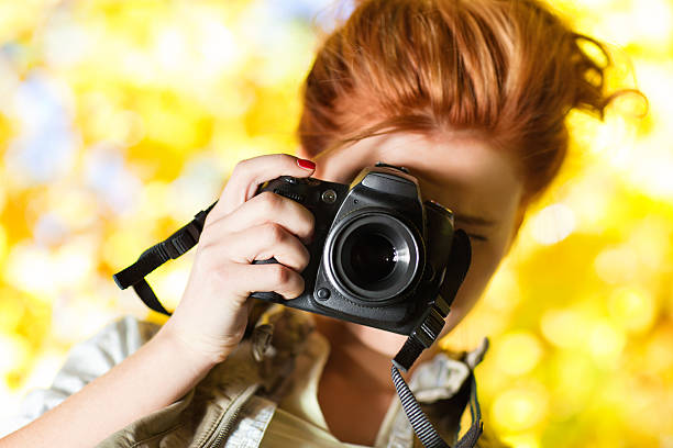 istock Young woman photographer 152967476