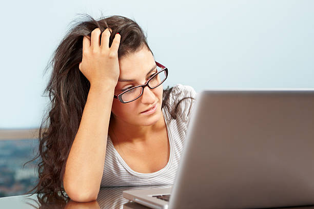 istock Depressed lady in front of laptop 152967597