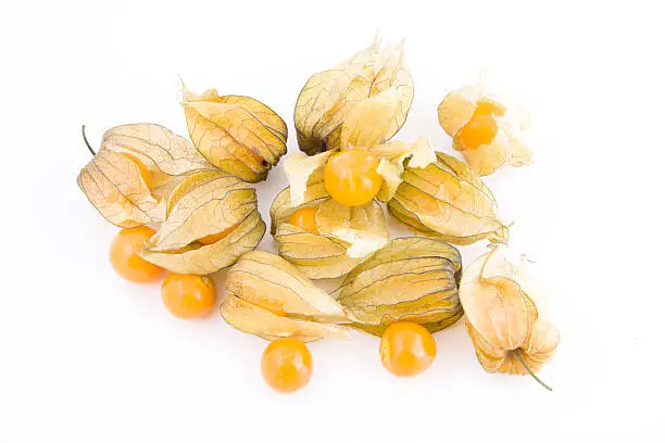 Fresh small physalis fruits isolated on white background, jam-berry