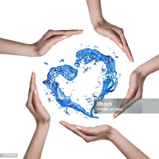 Heart From Water Splash With Human Hands Isolated On White Stock Photo - Download Image Now