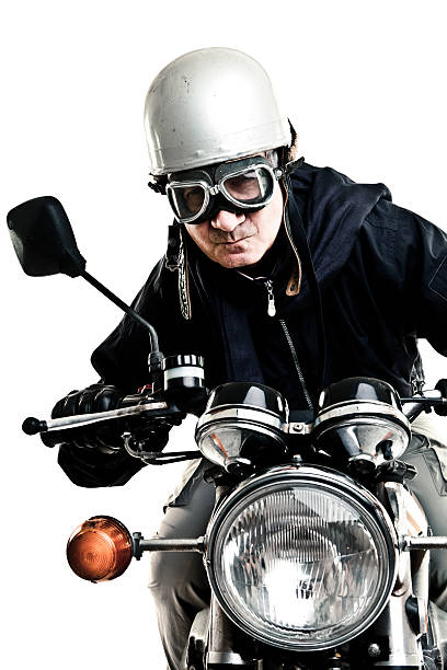 istock vintage dressed man drive motorcycle with helmet and glasses 152968290