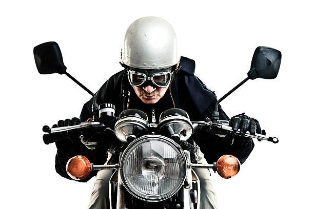 Milton Keynes,UK - July 18th 2024: Man riding a 2021 Herald sm 125 25b Scrambler motorcycle on a British country road