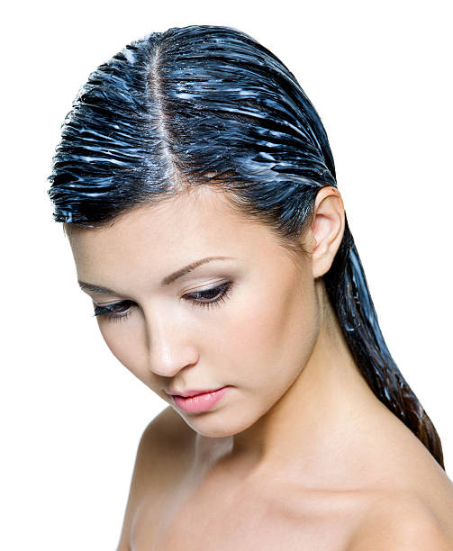 istock woman with paint for hairs on them 152968367