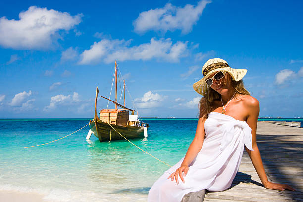istock Young woman on a pier 152969600