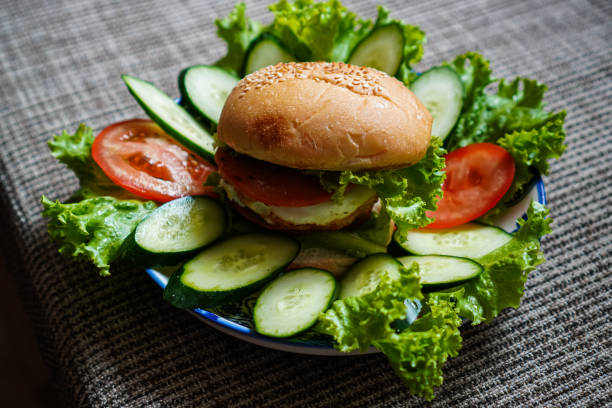 A side view photo shows a vegetarian burger set menu for a healthy breakfast.