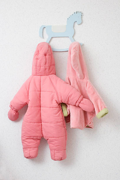 istock Baby clothes on a coat rack 152969883