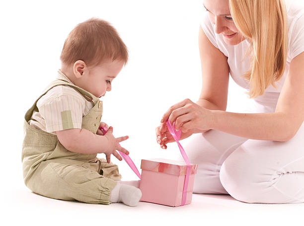 istock Mother present to her baby boy gift 152970071