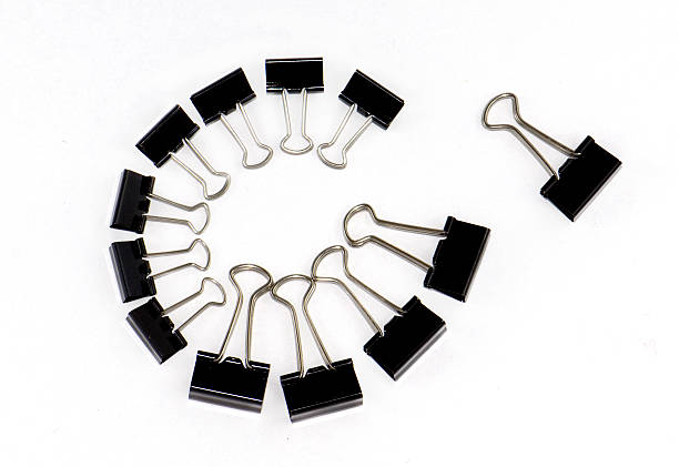 Binder clips in a circle stock photo
