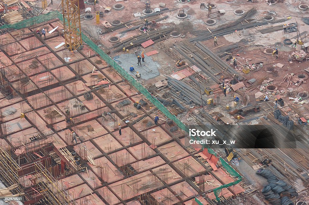 The construction field The workers and machines on the counstruction field Aerial View Stock Photo