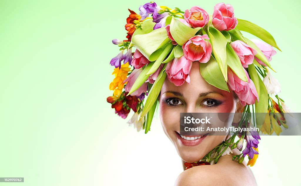 beauty woman portrait with wreath from flowers beauty woman portrait with wreath from flowers on head green background 20-29 Years Stock Photo