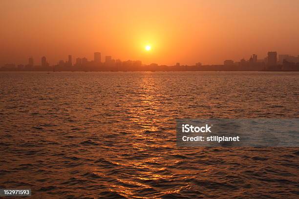 Mumbai Skyline At Sunset Stock Photo - Download Image Now - Mumbai, Orange Color, Red