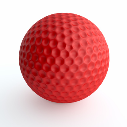 Red golf ball isolated on white