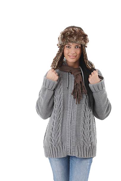 istock Young woman in warm sweater smiling 152972215