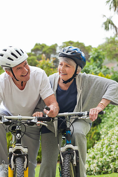 istock Mature couple mountain biking outside 152972714