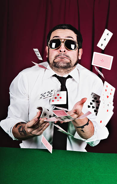 istock Newbie poker player throwing cards 152972992