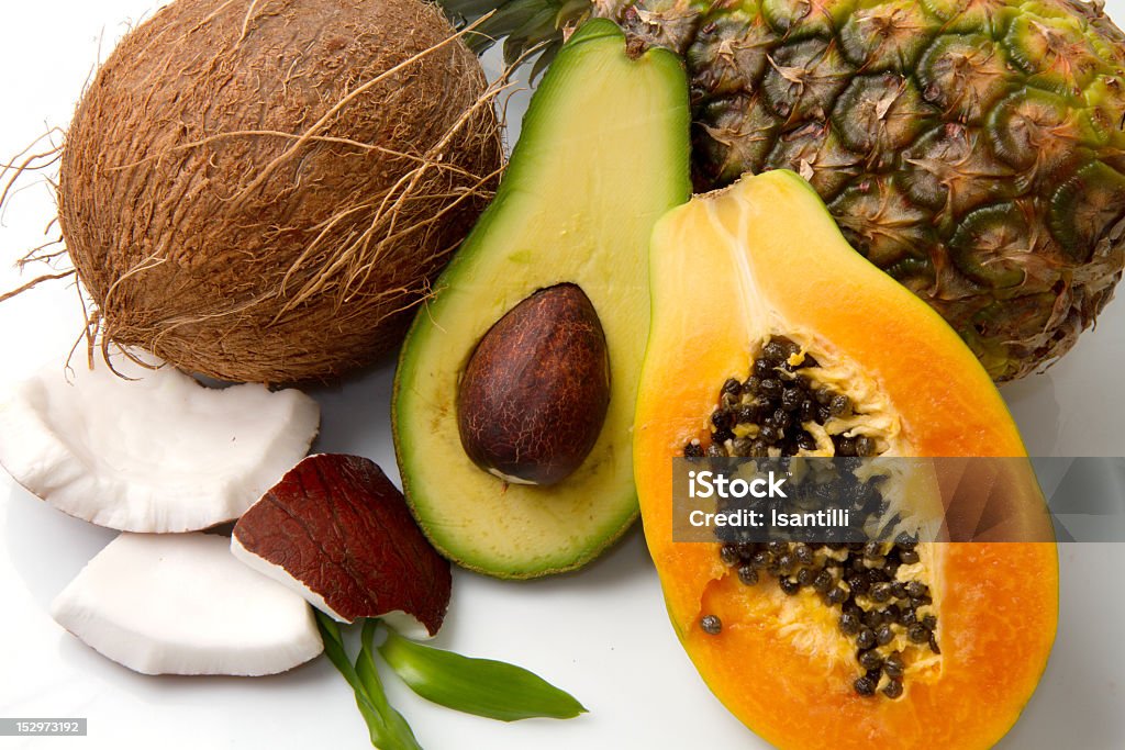 Close-up of assorted tropical fruits tropical fruit on white background Avocado Stock Photo