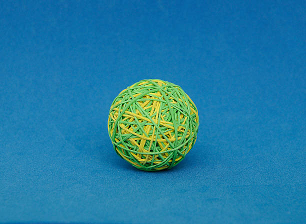 istock green and yellow rubber band ball 152973284