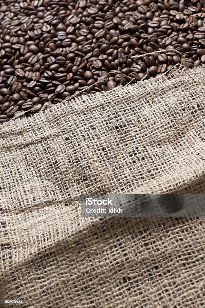 Bag full of coffee beans Freshly roasted coffee beans in a large canvas bag Agriculture Stock Photo