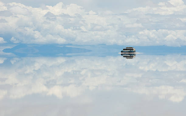 istock Bus, driving through salt lake, bolivia 152974532