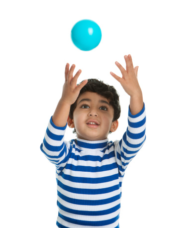 Toddler attempting to catch a Ball, Isolated, White