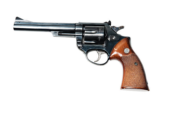 Antique revolver handgun isolated on white stock photo