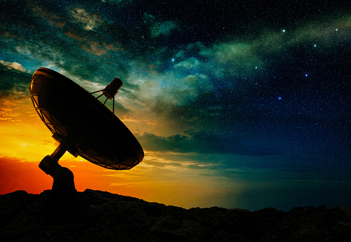 silhouette of a radio telescope at sunset, 3d illustration