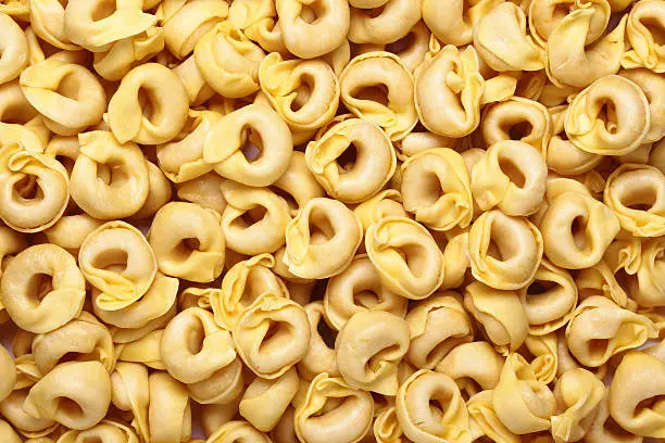 Texture of italian pasta tortellini.