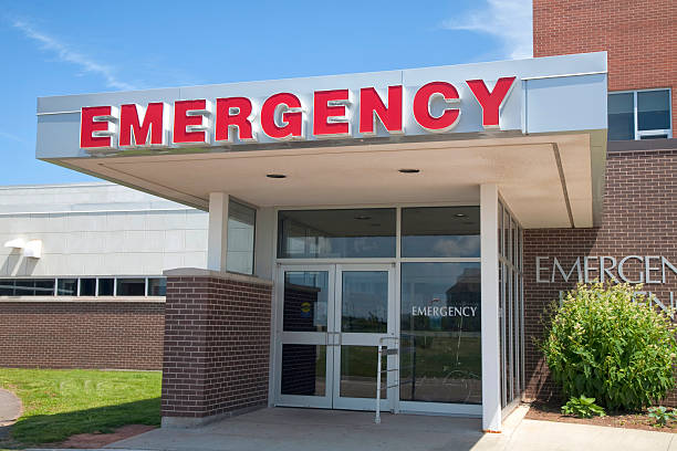 Front view of hospital emergency entrance The emergency entrance of a medical hospital. emergency room stock pictures, royalty-free photos & images