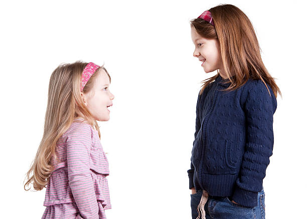 istock Little sister talking to big sis 152976426