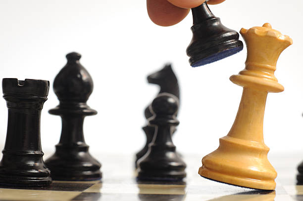 istock Pawn beatting the Queen 152977033