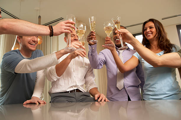 Friends toast with champagne. stock photo