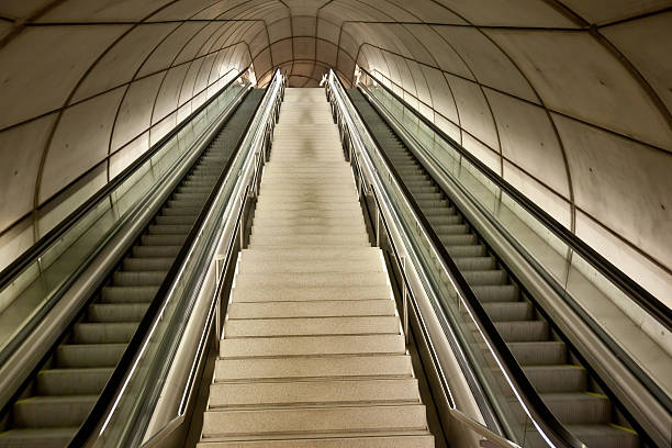 istock straigh large staircase and scalators 152978201
