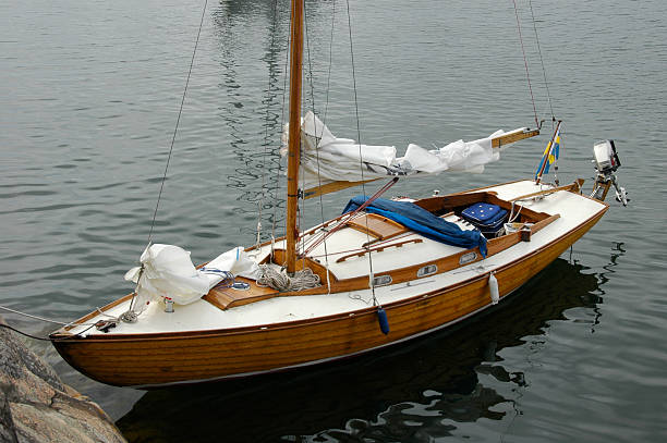 Wooden boat deck on open sea.