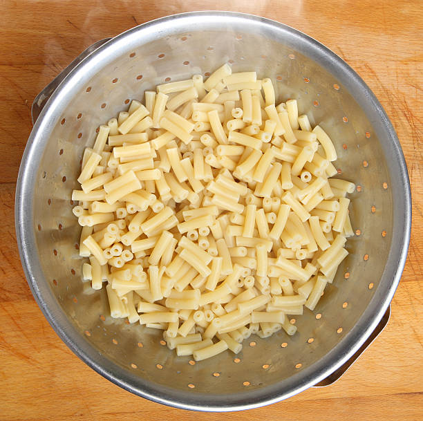 Steaming Using Colander 190+ Steaming Strainer Of Noodles Stock Photos, Pictures & Royalty-Free ...