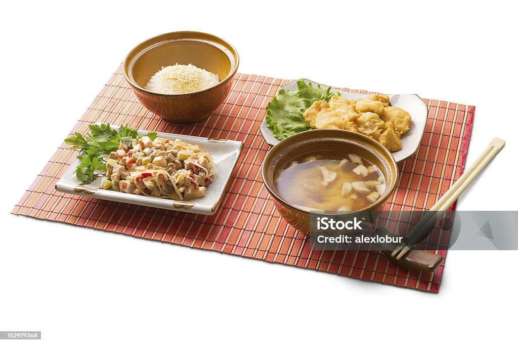 Déjeuner d'affaires asiatique avec du riz, une soupe miso, tempura, gedze, baguettes chinoises - Photo de Soupe miso libre de droits