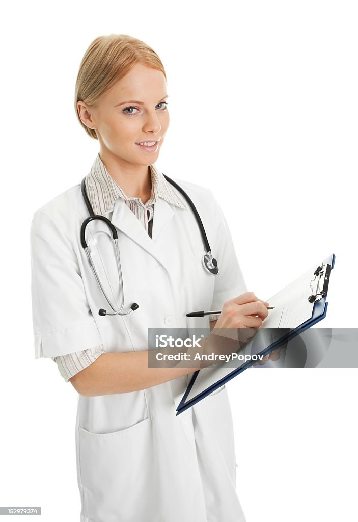 Alegre médico mulher preencher receita - Foto de stock de Adulto royalty-free