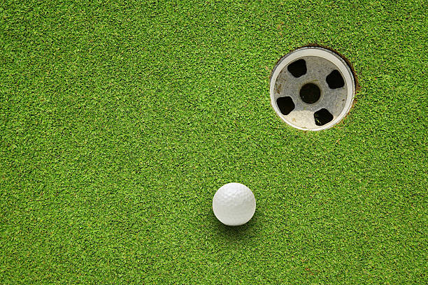 istock A picture of a golf ball almost in the hole 152979708