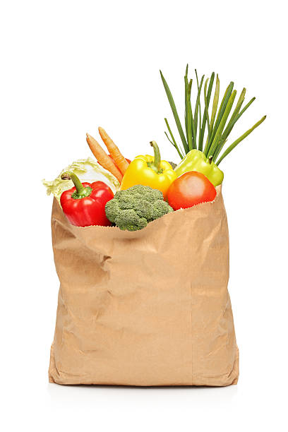 продуктовый мешок полный с свежие овощи - broccoli vegetable food isolated стоковые фото и изображения