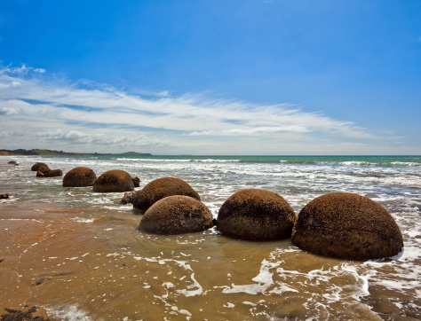 the moeraki boulders, located on the coast south of Oamaru, south island, New Zealand.