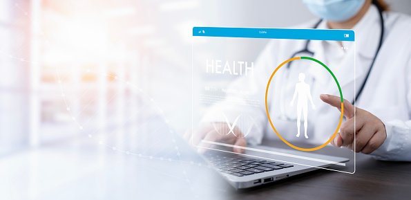 Medical doctor and medical technology and futuristic concept, Doctor using laptop and health medical network connection icon on virtual screen interface, Modern medical technology and innovation.