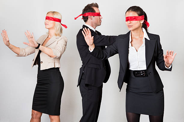 istock Group of disoriented businesspeople 152981513