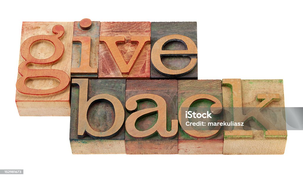 Dare indietro le parole in legno font - Foto stock royalty-free di Astratto