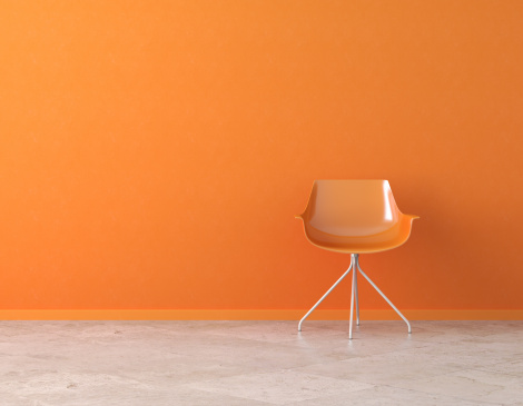 orange simple interior with chair and copy space on the wall