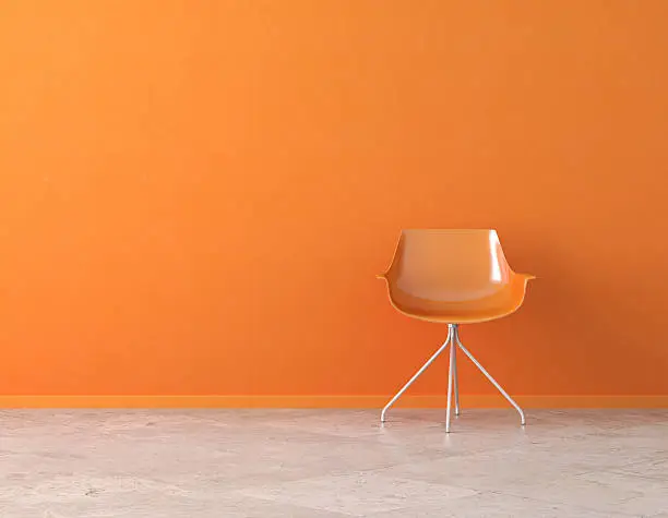 Photo of orange wall interior with copy space