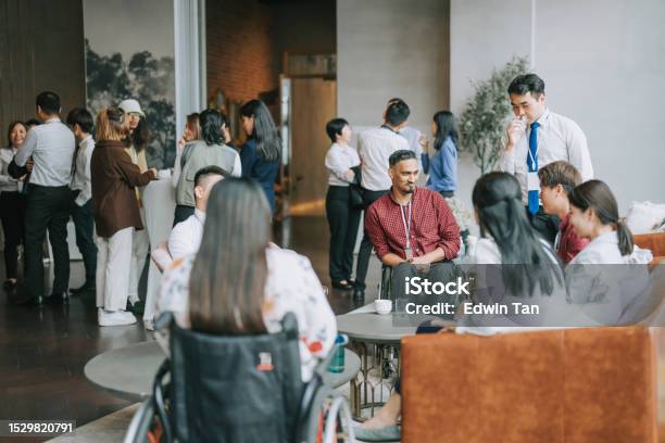 Asian Multi Ethnic Business People Talk During A Coffee Break In Seminar Business Conference Stock Photo - Download Image Now