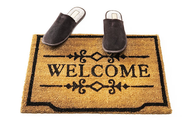istock Welcome mat and slippers 152982153