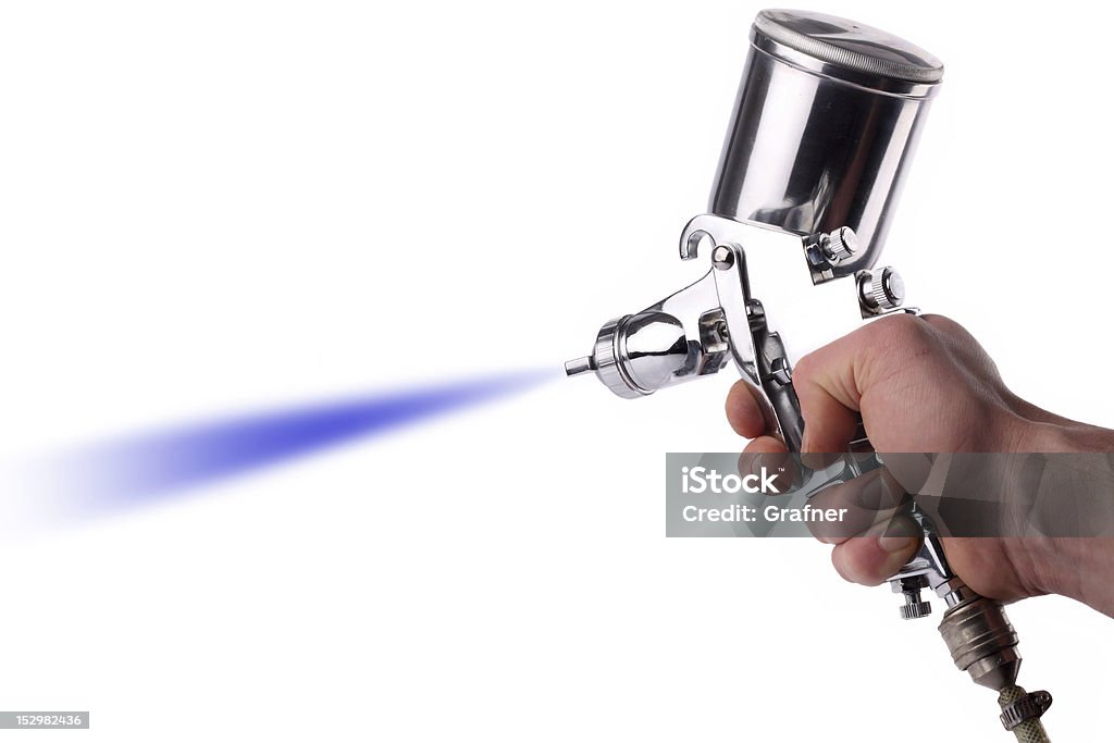 spray gun hand with spray gun Paint Spray Gun Stock Photo